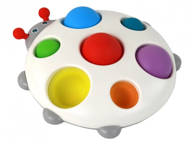 Colorful Ladybug Pop It Sensory Board