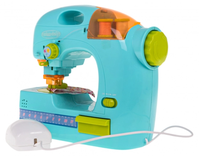 Interactive Blue Sewing Machine with Accessories