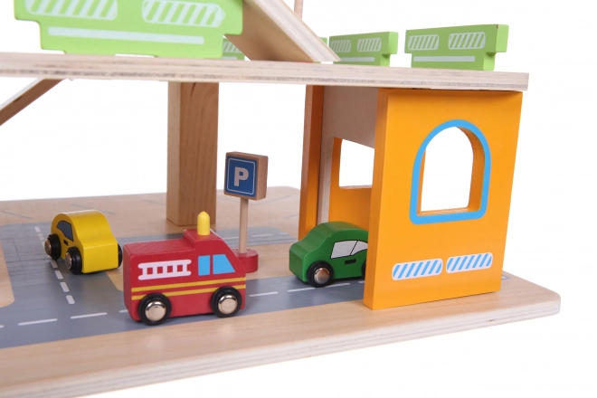 wooden multi-level garage with elevator and toy cars