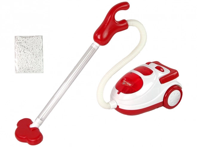 Red Children's Toy Vacuum with Styrofoam Balls