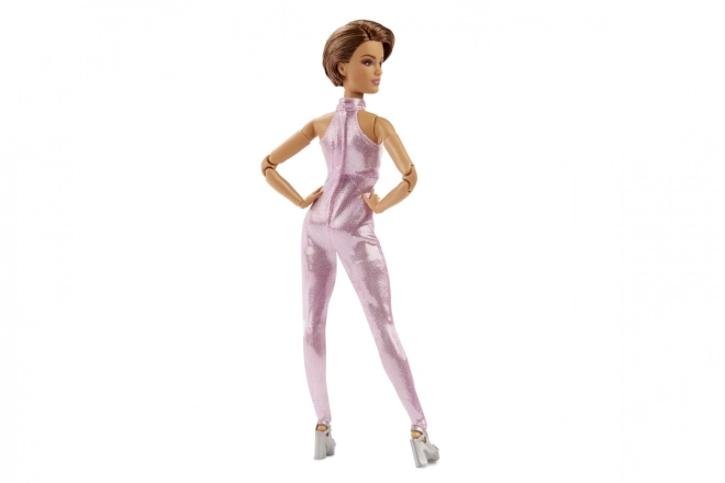 Barbie fashion doll with short hair in pink outfit