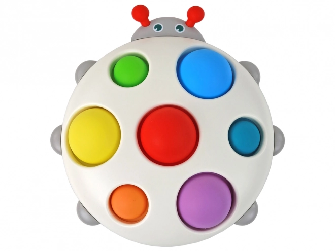 Colorful Ladybug Pop It Sensory Board