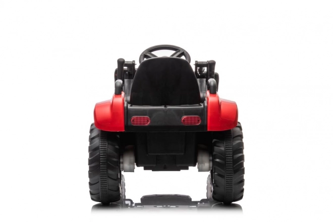 Trattore rosso per bambini con batteria ricaricabile e pala