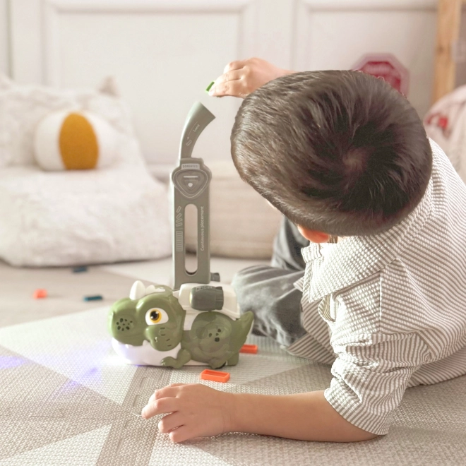 Dinosauro verde interattivo WOOPIE con trenino elettrico e domino
