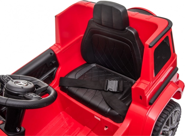 Children's battery-powered car Mercedes G63 red