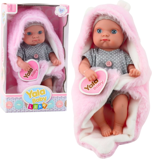 Bambola di stoffa bebè in pigiamino grigio con copertina rosa con orecchie da coniglietto 23 cm