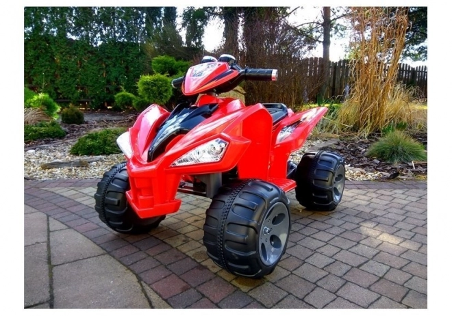 Red Battery-Powered Quad with Large Wheels