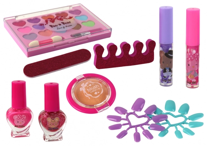 Cosmetic set for makeup and nails in a pink case