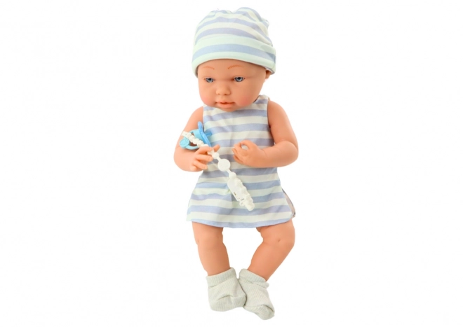 Baby Doll in White and Blue Outfit with Hat and Pacifier