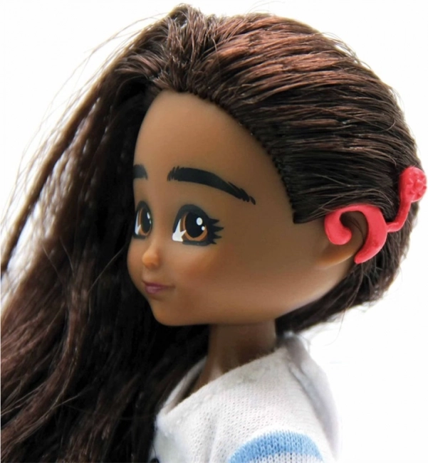 Realistic doll with cochlear implant