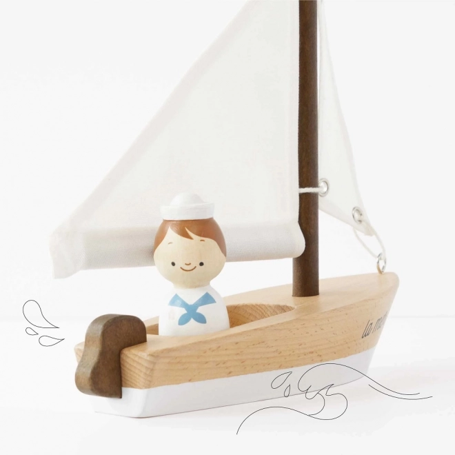 Le Toy Van wooden sailboat with captain