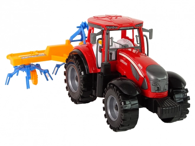 Red Tractor with Rake Friction Drive