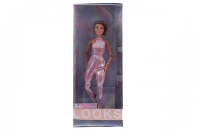 Barbie fashion doll with short hair in pink outfit