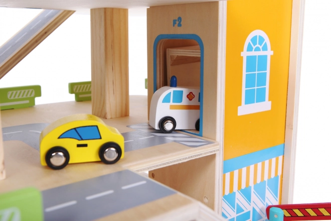 wooden multi-level garage with elevator and toy cars