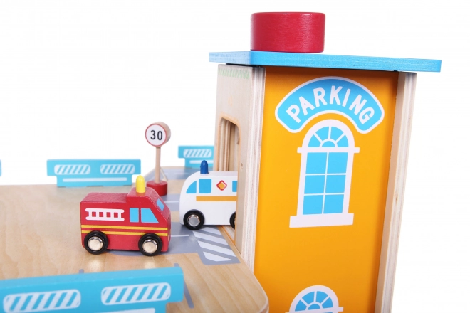 wooden multi-level garage with elevator and toy cars