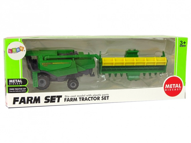 Green and Yellow Toy Farm Tractor with Seeder