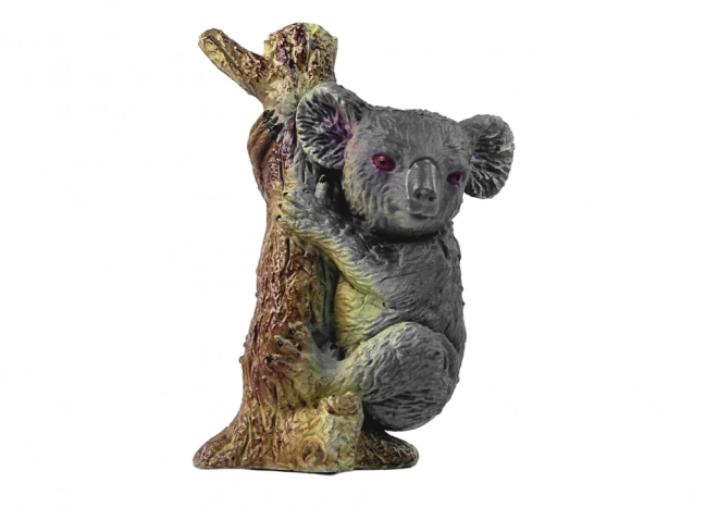 Koala Figurine on Tree