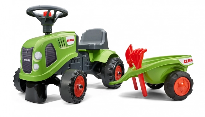 ride-on toy tractor with trailer and gardening tools