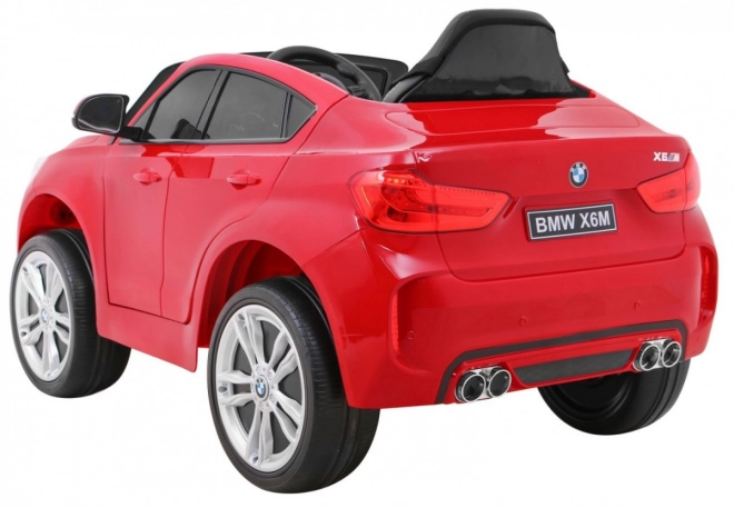 Mașină electrică pentru copii BMW X6M vopsită + telecomandă + EVA + pornire lentă + audio + LED – Červené