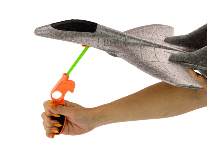 Gray Foam Glider with Slingshot Launcher