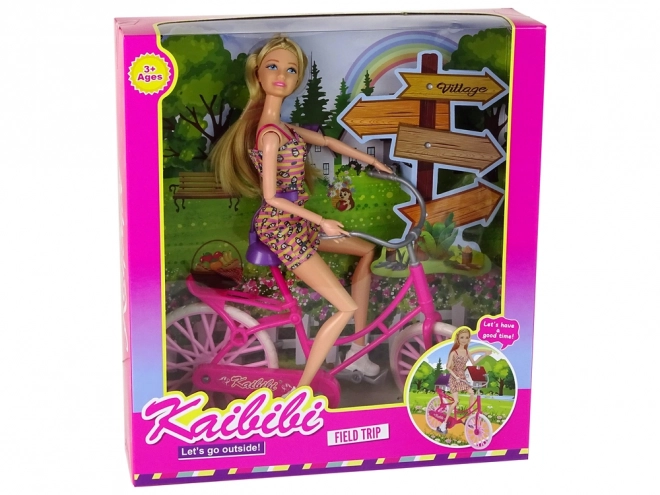 Doll on Pink Bicycle