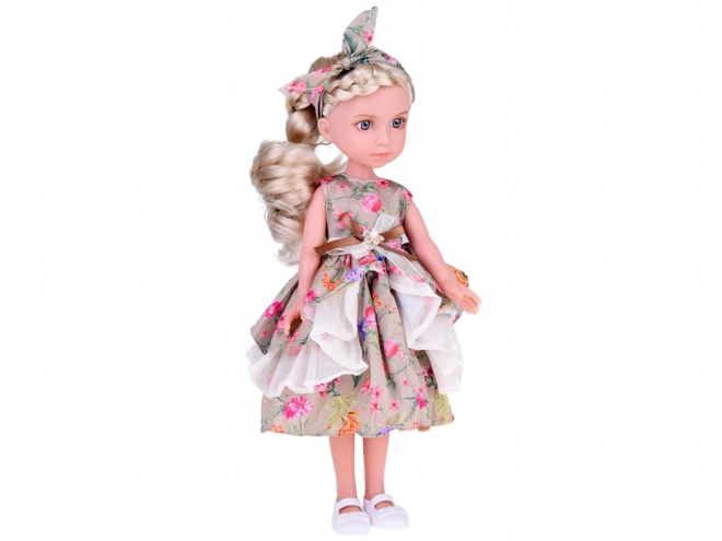 Elegant Doll in a Floral Dress