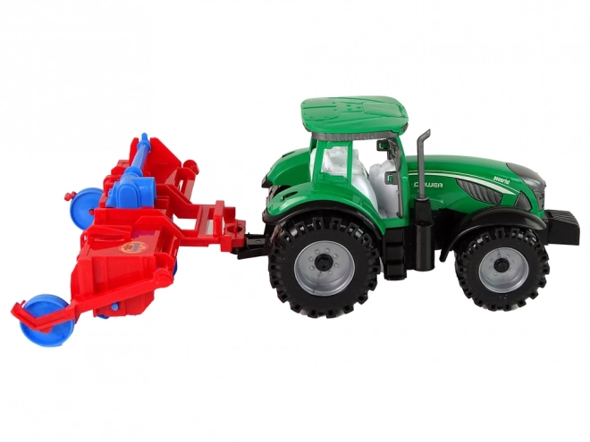 Friction-Powered Red Tractor with Plow