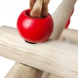 Children’s wooden swing with safety rail