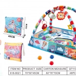 Educational play mat for the littlest ones with hanging toys and balls