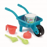 Garden wheelbarrow with watering can and bucket