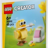 Lego Creator painting Easter eggs with a chick