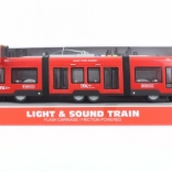 Rød sporvogn på batteri med effekter