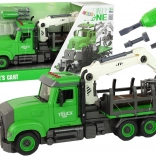 camion vert de transport de bois avec grue et lumières