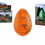 Ei met uitkomende dinosaurus