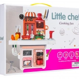 Pink interactive kids’ kitchen with lights and sounds