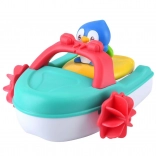 Wind-up water boat with penguin